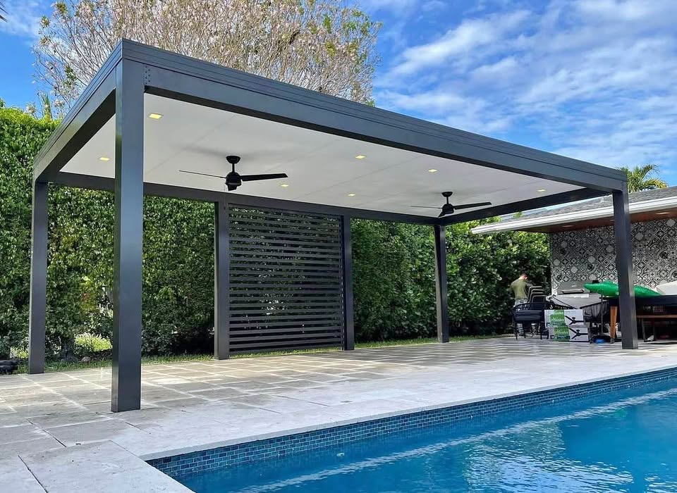 Poolside insulated pergola with fans and privacy wall
