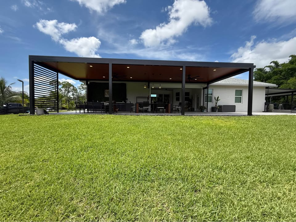 Large attached pergola across backyard